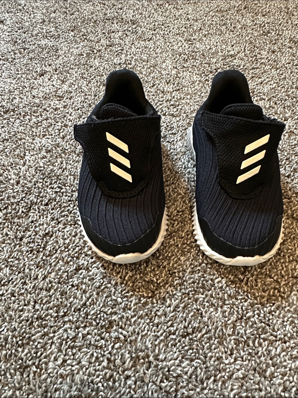 adidas Kids Black Athletic Slip-On Sneakers with White Stripes